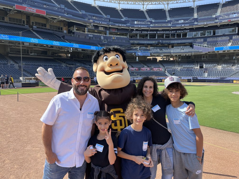 Sam Daoud with his family and the San Diego Padres mascot at Petco Park