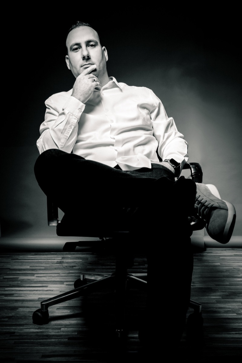 Black-and-white portrait of Sam Daoud